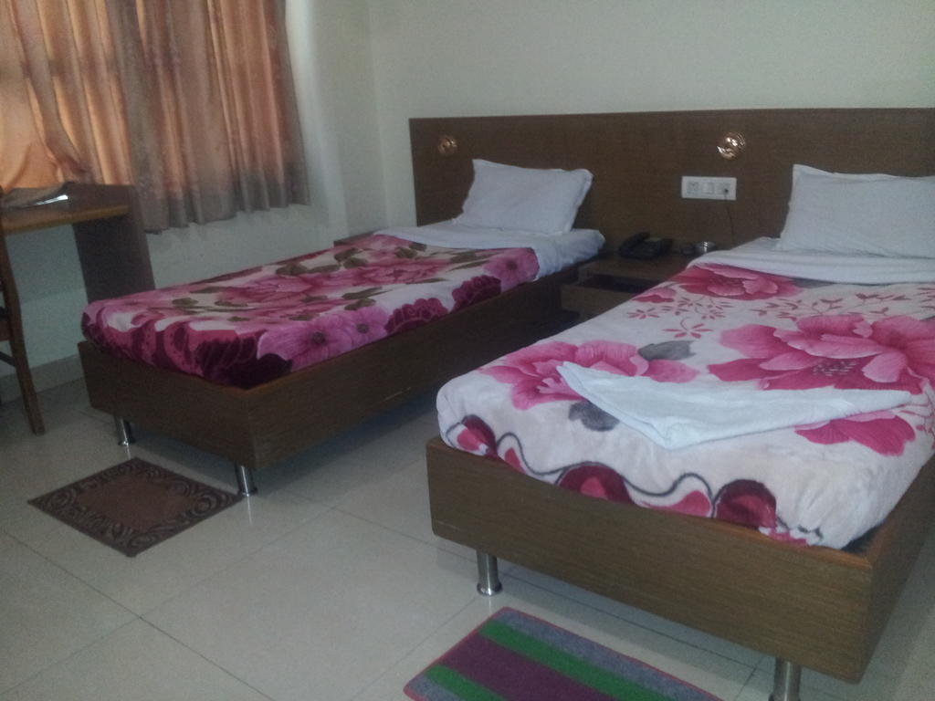 Hotel Fame City Guwahati Rom bilde